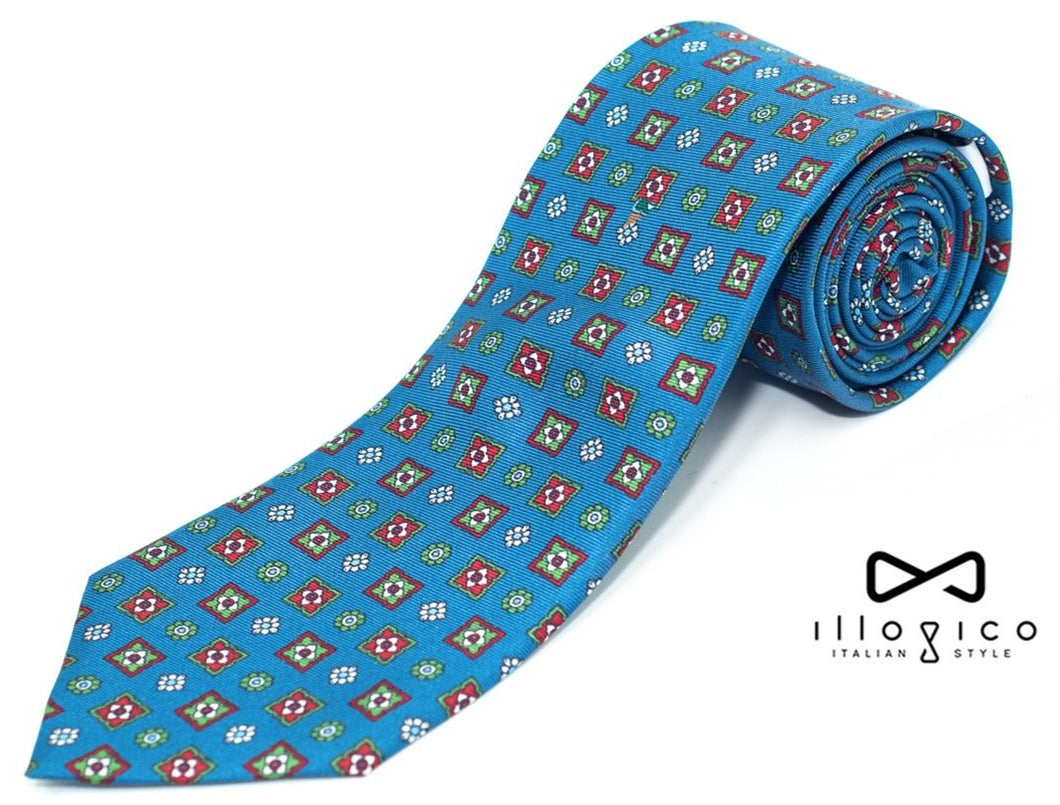 Cravatta In Seta Blu Avion Con Fantasia Geometrica Rossa
