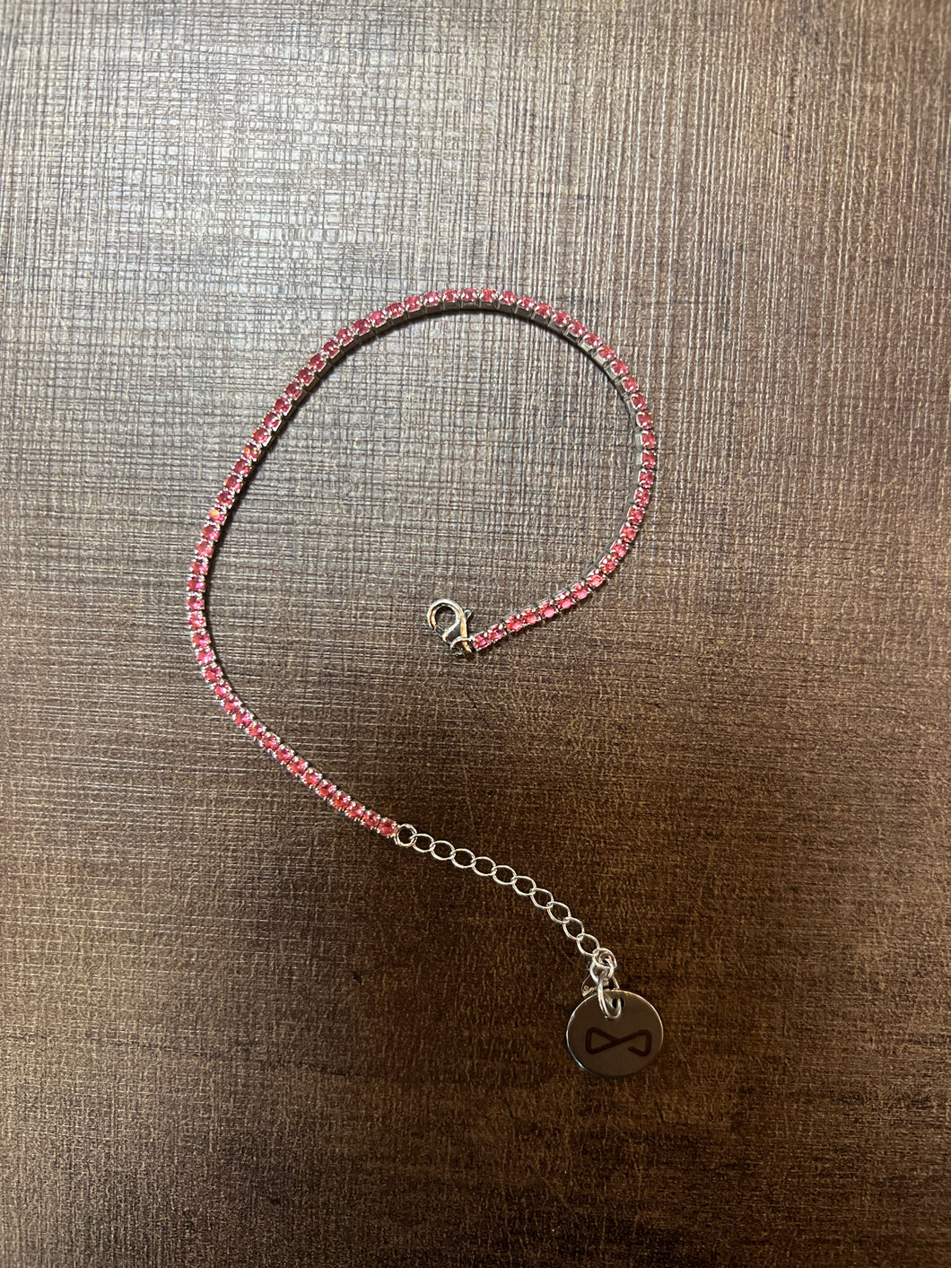 Silver 925 Bracelet with pendant logo and purple stones